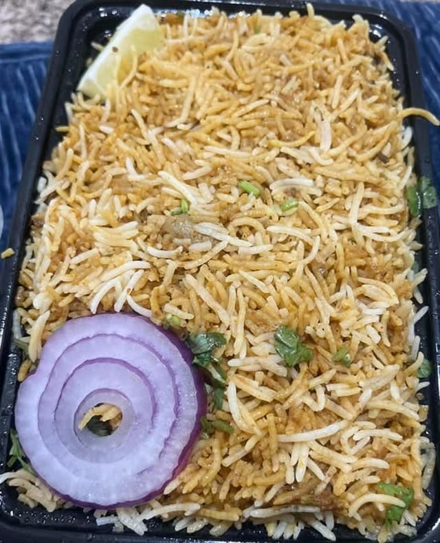 Hyderabadi Chicken Dum Biryani.