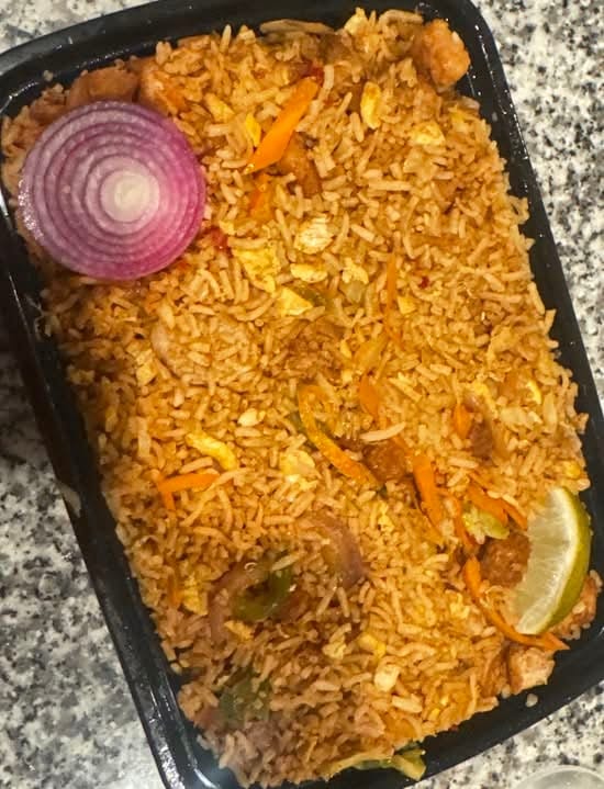 Schezwan Chicken Fried Rice.